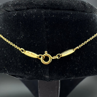 Tiffany & Co. Peretti Infinity Cross 18K Gold Pendant Necklace